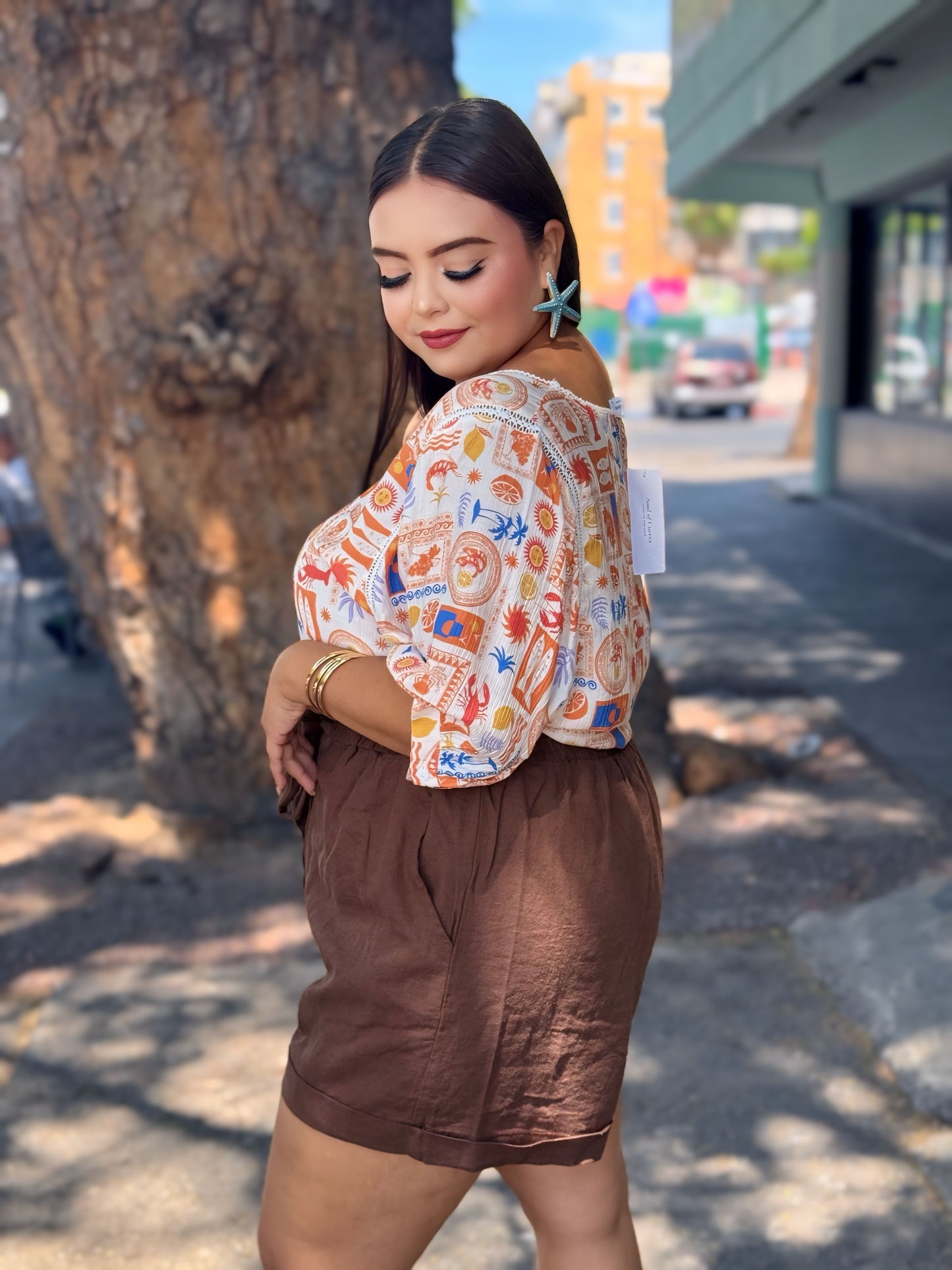 Blusa vacaciones naranja