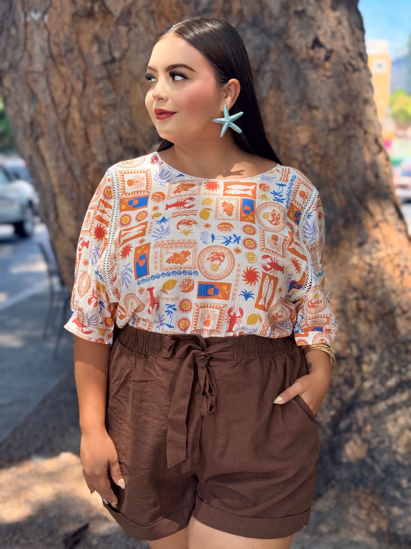 Blusa vacaciones naranja