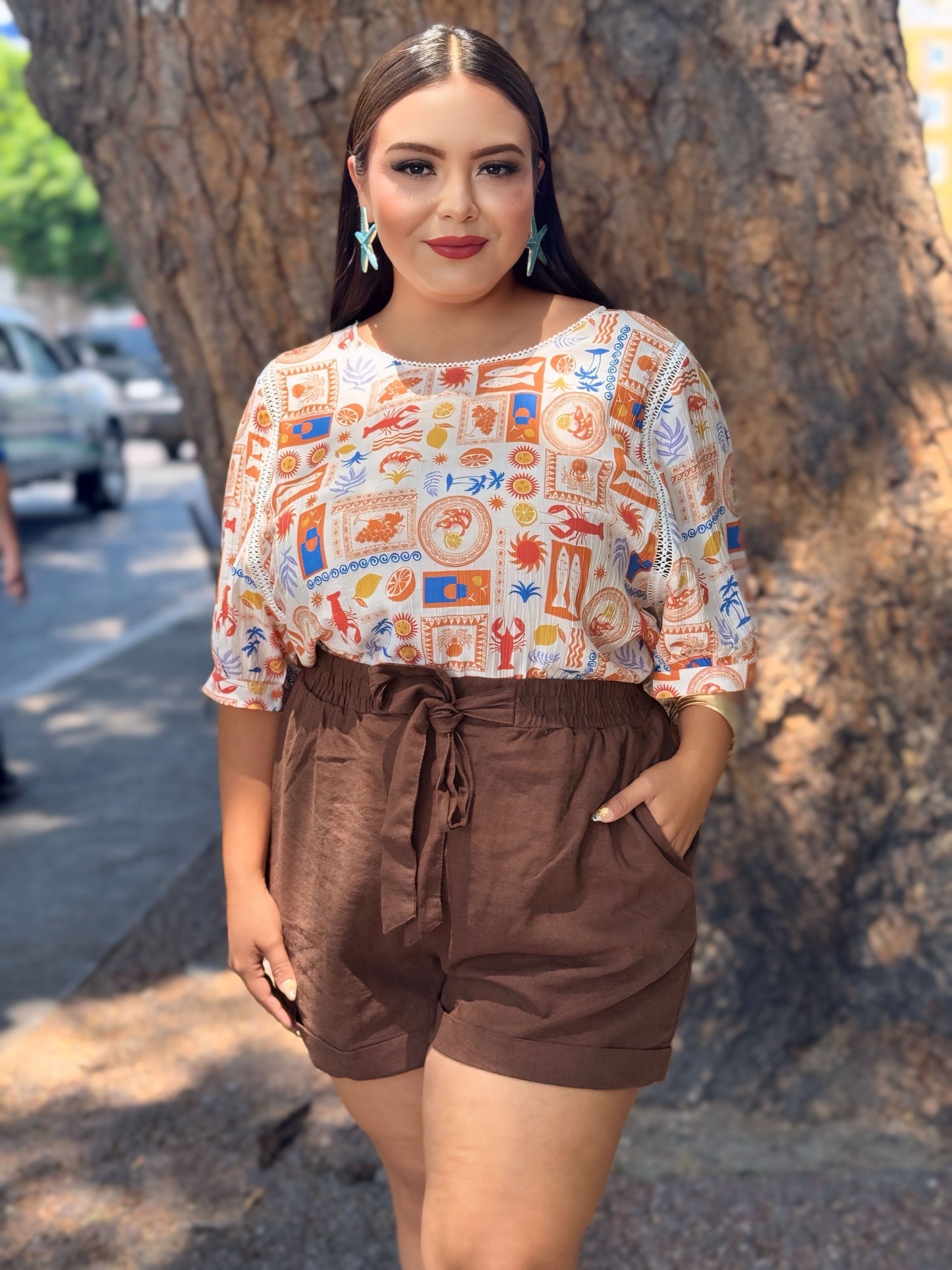 Blusa vacaciones naranja