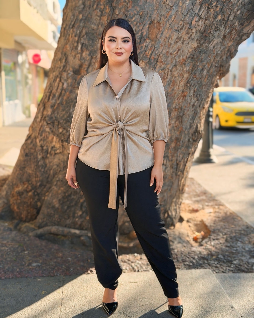 Blusa dorada lazo